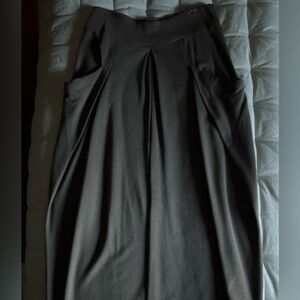 Stylish dark Brown Maxi Skirt. Wide elastic waist. Front pockets and pleats.